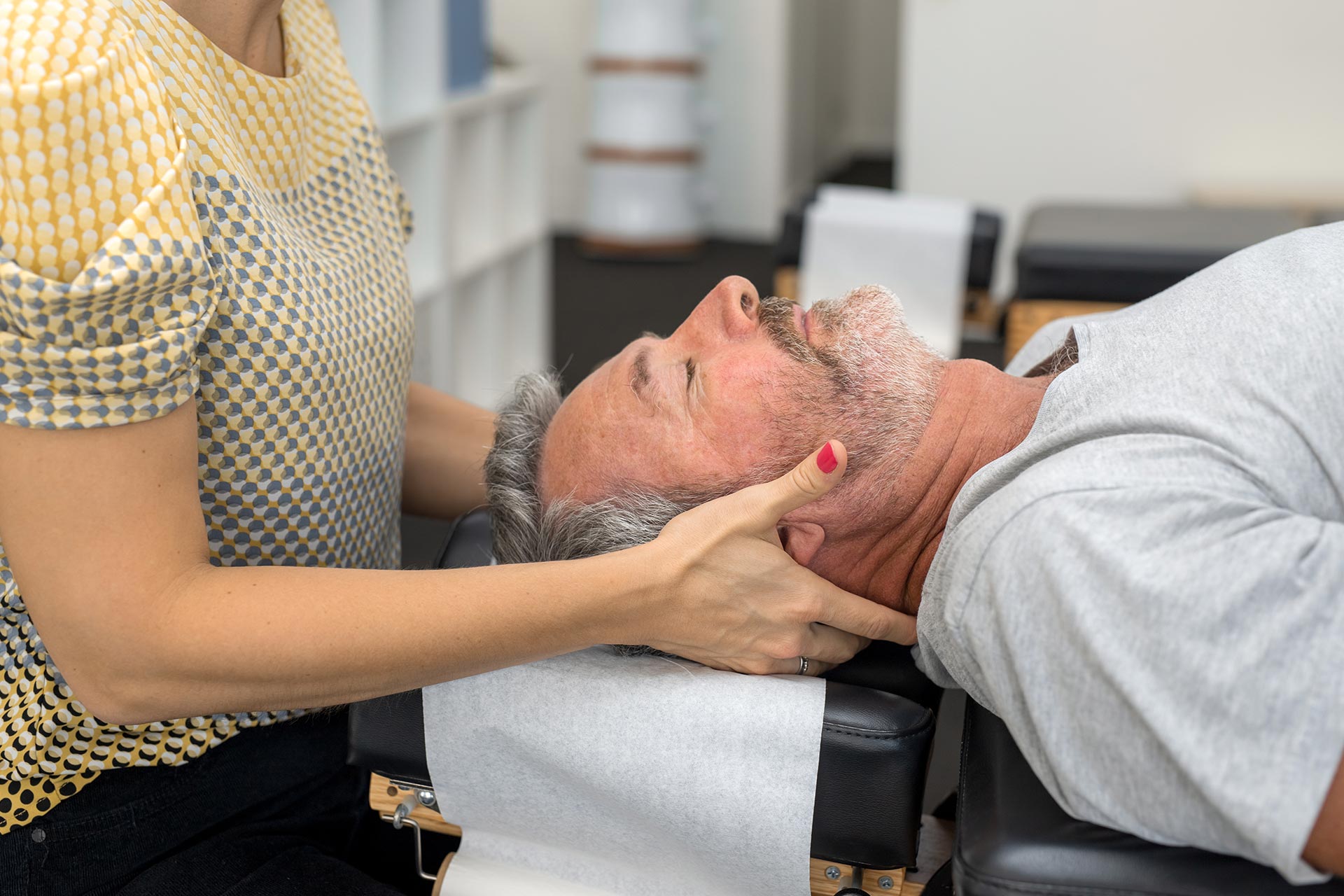 Chiropractor performing spinal adjustment at Chiro Prro clinic